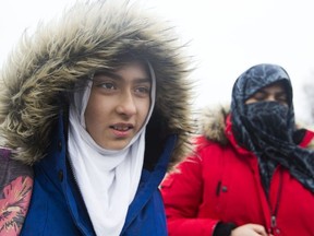 Khawlah Noman and her mother Saima Samad, (right) arrive at Pauline Johnson Public School in Toronto, Ont. on Jan. 12, 2018.