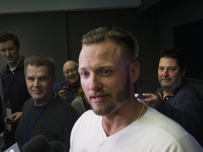 Jays superstar Josh Donaldson meets with the media yesterday at the Rogers Centre. The former AL MVP wants to stick around. Stan Behal/Postmedia Network
