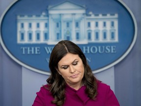 White House press secretary Sarah Huckabee Sanders pauses while speaking to the media during the daily press briefing at the White House, Monday, Jan. 29, 2018, in Washington.   (AP Photo/Andrew Harnik)