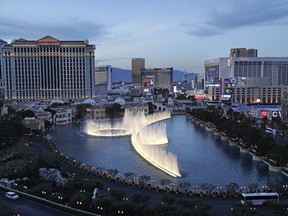 In this April 4, 2017, file photo, the fountains of Bellagio erupt along the Las Vegas Strip in Las Vegas. (AP Photo/John Locher, File)