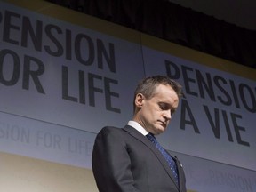 Minister of Veterans Affairs Seamus O'Regan listens to a question during an announcement for changes to veterans pensions during a news conference at National Defence head quarters in Ottawa, Wednesday Dec. 20, 2017.  THE CANADIAN PRESS/Adrian Wyld