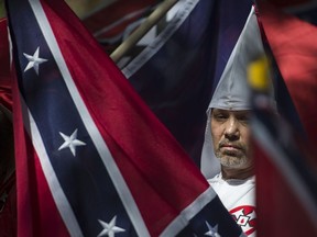 This file photo taken on July 08, 2017 shows a member of the Ku Klux Klan during a rally, calling for the protection of Southern Confederate monuments, in Charlottesville, Virginia.