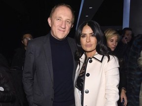 Francois-Henri Pinault and Salma Hayek Pinault attend the Bottega Veneta Fall/Winter 2018 fashion show at New York Stock Exchange on February 9, 2018 in New York City.