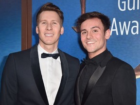 Dustin Lance Black and Tom Daley attends the 2018 Writers Guild Awards L.A. Ceremony at The Beverly Hilton Hotel on February 11, 2018 in Beverly Hills, California.