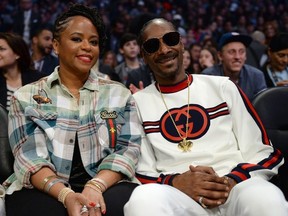 Snoop Dogg and wife Shante attend the NBA All-Star Game 2018 at Staples Center on February 18, 2018 in Los Angeles, California.