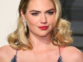 (FILES) In this file photo taken on February 26, 2017 US model and actress Kate Upton poses as she arrives to the Vanity Fair Party following the 88th Academy Awards at The Wallis Annenberg Center for the Performing Arts in Beverly Hills, California. Supermodel Kate Upton has accused fashion giant Guess's co-founder Paul Marciano of sexually harassing women. Upton, 25, did not cite a specific incident in her criticism January 31, 2018 of Guess co-founder and creative director Marciano, who is 65. Upton, who was once the face of Guess, became the latest star to add her voice to the global #MeToo campaign against sexual misconduct, that kicked off following accusations against Hollywood mogul Harvey Weinstein.