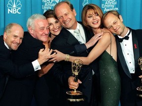 In this file photo taken on Sept. 13, 1998 the cast of the television situation comedy "Frasier" pose with their Emmy for Outstanding Comedy Series at the 50th Annual Primetime Emmy Awards in Los Angeles (From L-R:) Dan Butler, John Mahoney, Peri Gilpin, Kelsey Grammer, Jane Leeves and David Hyde Pier/AFP/Getty Images)
