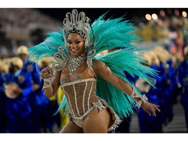 A reveller of the Unidos da Tijuca samba school performs during the second night of Rio's Carnival at the Sambadrome in Rio de Janeiro, Brazil, on February 12, 2018. (MAURO PIMENTEL/AFP/Getty Images)