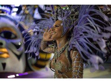 A reveller of the Salgueiro samba school performs during the second night of Rio's Carnival at the Sambadrome in Rio de Janeiro, Brazil, on February 13, 2018.
