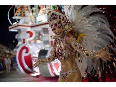 A reveller of the Salgueiro samba school performs during the second night of Rio's Carnival at the Sambadrome in Rio de Janeiro, Brazil, on February 13, 2018.