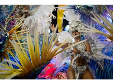 A reveller of the Beija-Flor samba school performs during the second night of Rio's Carnival at the Sambadrome in Rio de Janeiro, Brazil, on February 13, 2018. (MAURO PIMENTEL/AFP/Getty Images)