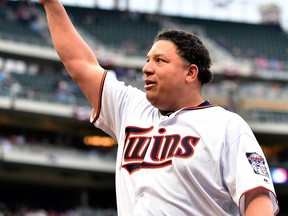 Minnesota Twins pitcher Bartolo Colon salutes the crowd after being relieved in the seventh inning of a game on Oct. 1, 2017