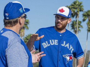 Blue Jays manager John Gibbons has a discussion with pitcher Joe Biagini in Dunedin, Fla. How serious it is we can only guess. THE CANADIAN PRESS/Frank Gunn