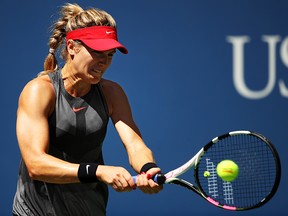 Eugenie Bouchard returns a shot to Evgeniya Rodina at the 2017 U.S. Open August 30, 2017 in New York City. (Clive Brunskill/Getty Images)