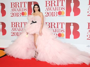 Dua Lipa arrives at the  Brit Awards held at the O2 Arena in London, Feb. 21, 2018. (Lia Toby/WENN.com)