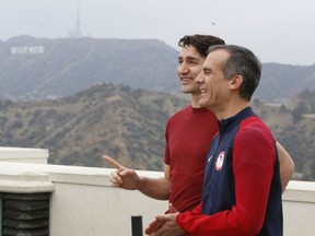 Canadian Prime Minister Justin Trudeau, left, and Los Angeles Mayor Eric Garcetti hold a joint news conference at the Griffith Observatory Saturday, Feb. 10, 2018.