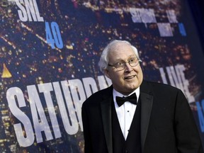 FILE - In this Feb. 15, 2015 file photo, Chevy Chase attends the SNL 40th Anniversary Special at Rockefeller Plaza, in New York.  Police say the 74-year-old Chase was driving in South Nyack on Feb. 9, 2018 when he was cut off in traffic by a 22-year-old Long Island man. Authorities say the driver and Chase got into a verbal argument, which led to a passenger in the car cursing at Chase and kicking him in the shoulder. The driver contends the kick was self-defense because Chase threw a punch first.