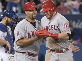 The Angels traded first baseman C.J. Cron (right) to the Rays on Saturday, Feb. 17, 2017.