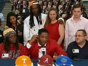 Receiver Jacob Copeland of Escambia High School in Florida announces his choice of college on live TV.