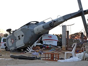 View of the remains of the military helicopter that fell on a van in Santiago Jamiltepec, Oaxaca state, Mexico, on Feb. 17, 2018. (PATRICIA CASTELLANOS/AFP/Getty Images)