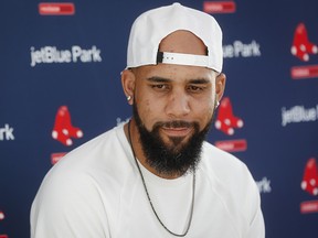 Boston Red Sox pitcher David Price speaks to the media at spring training, Tuesday, Feb. 13, 2018, in Fort Myers, Fla. (AP Photo/John Minchillo)