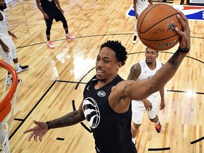 Team Stephen's DeMar Derozan, left, of the Toronto Raptors, goes up for a dunk during the second half of the NBA All-Star Game, Sunday, Feb. 18, 2018, in Los Angeles. (Bob Donnan via AP, Pool)