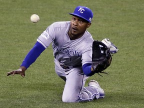 Kansas City Royals' Jarrod Dyson makes a diving catch during Game 4 of the World Series Saturday, Oct. 25, 2014, in San Francisco. (AP Photo/Eric Risberg)
