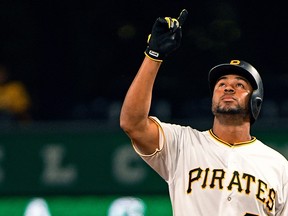 Elias Diaz of the Pittsburgh Pirates points to the sky after hitting a double in the third inning during the game against the Milwaukee Brewers at PNC Park on September 20, 2017 in Pittsburgh, Pennsylvania. (Justin Berl/Getty Images)