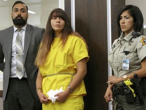 In this July 28, 2017 file photo, Obdulia Sanchez appears in a Los Banos, Calif., branch of the Merced County Superior Court with her public defender, Ramnik Samrao, left. Sanchez has been sentenced to six year and four months in prison for driving drunk while livestreaming the crash that killed her younger sister. The Merced Sun Star reports 19-year-old Obdulia Sanchez was sentenced Thursday, Feb. 8, 2018 after being convicted of gross vehicular manslaughter, DUI and child endangerment stemming from the July 2017 crash.