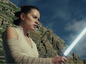 This image released by Lucasfilm shows Daisy Ridley as Rey in "Star Wars: The Last Jedi." "Star Wars: The Last Jedi" is off to a death star-sized start at the box office. Disney says Friday, Dec. 15, 2017,  that eighth installment in the space franchise has earned an estimated $45 million from Thursday night showings. (Lucasfilm via AP) ORG XMIT: NY110