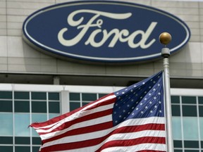 An American flag flies outside Ford Motor Company's world headquarters in Dearborn, Michigan on Monday, June 23, 2007.