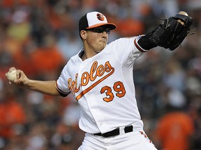 Baltimore Orioles starting pitcher Kevin Gausman delivers against the New York Yankees Sunday, July 13, 2014, in Baltimore. (AP Photo/Gail Burton)