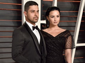 Actor Wilmer Valderrama (L) and singer Demi Lovato attend the 2016 Vanity Fair Oscar Party Hosted By Graydon Carter at the Wallis Annenberg Center for the Performing Arts on February 28, 2016 in Beverly Hills, California. (Photo by Pascal Le Segretain/Getty Images)