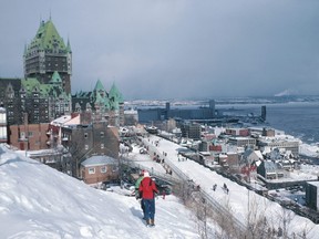 This stock image shows Quebec City's historic downtown along the St. Lawrence River.
