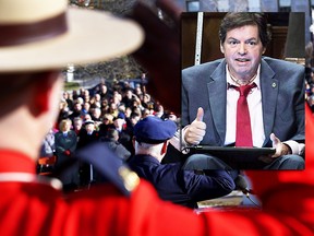 Ottawa-Vanier MP Mauril Belanger gives the thumbs up as he receives applause after using a tablet with text-to-speech program to defend his proposed changes to neutralize gender in the lyrics to "O Canada" in the House of Commons on Parliament Hill in Ottawa on Friday, May 6, 2016. CP