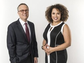 Michael Gerson and Amy Holmes pose for a promotional photo for their new PBS political talk show 'In Principle' which is set to begin airing April 13, 2018.