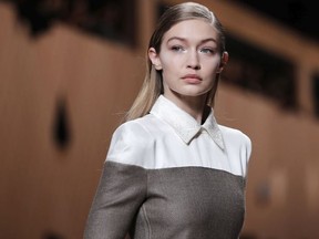 Model Gigi Hadid wears a creation as part of the Fendi women's Fall/Winter 2018-2019 collection, presented during the Milan Fashion Week, in Milan, Italy, Thursday, Feb. 22, 2018.