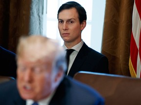 In this Nov. 1, 2017, file photo, White House senior adviser Jared Kushner listens as U.S. President Donald Trump speaks during a cabinet meeting at the White House in Washington. (AP Photo/Evan Vucci, File)