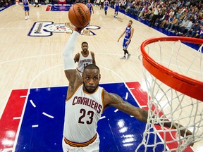 In this Nov. 5, 2016, file photo, Cleveland Cavaliers' LeBron James soars to the basket during the second half of an NBA basketball game against the Philadelphia 76ers in Philadelphia
