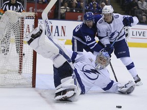 Toronto Maple Leafs centre Mitch Marner (16) is blocked off the puck by Tampa Bay Lightning goaltender Andrei Vasilevskiy in Toronto on Monday February 12, 2018. (Veronica Henri/Toronto Sun)