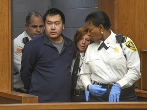 Jeffrey Yao is brought into Woburn District Court, Monday, Feb. 26, 2018 in Woburn, Mass.