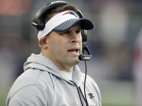 In this Jan. 21, 2018, file photo, New England Patriots offensive coordinator Josh McDaniels watches from the sideline during the AFC championship game against the Jacksonville Jaguars in Foxborough, Mass. (AP Photo/Charles Krupa, File)