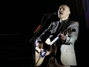 In this Saturday, March 26, 2017 file photo, Billy Corgan of the Smashing Pumpkins performs at The Theatre at Ace Hotel in Los Angeles. A Smashing Pumpkins representative said Monday, Feb. 12, 2018, that the band has tried to include ex-bassist D'arcy Wretzky in its upcoming reunion, although she says frontman Corgan invited her to re-join the group but then rescinded the offer.