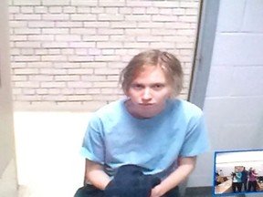 Anne Norris, 28, charged with first-degree murder, appears via video link from the Correctional Centre for Women in Clarenville, N.L., on Tues. May 24, 2016. THE CANADIAN PRESS/SUE BAILEY