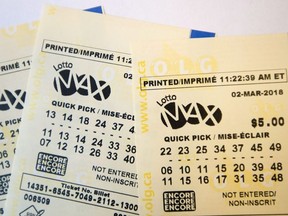 A lotto Max ticket is shown in Toronto on Monday Feb. 26, 2018.