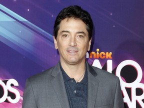 FILE - In this Nov. 17, 2012 file photo, actor Scott Baio arrives at the TeenNick HALO Awards in Los Angeles. Former "Charles in Charge" actor Alexander Polinsky says Baio assaulted and "mentally tortured" him during their time together on the show in the 1980s. Polinsky made the allegations Wednesday, Feb. 14, 2018, in Los Angeles during a news conference called by his attorney.