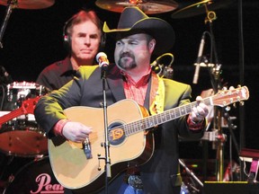 FILE - In this Nov. 22, 2013 file photo, Daryle Singletary performs at a tribute to George Jones in Nashville, Tenn. Singletary, who sang songs like "I Let Her Lie" and "Too Much Fun," died Monday, Feb. 12, 2018, at his home in Lebanon, Tenn. He was 46. The cause of death is pending.