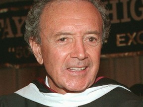 FILE - In this Feb. 3, 1997 file photo, singer Vic Damone poses after becoming a member of Lafayette High School's midyear graduating class, in the Brooklyn borough of New York. Damone died Sunday, Feb. 11, 2018, at a Miami Beach hospital from complications of a respiratory illness. He was 89.