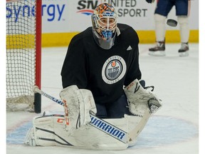 Edmonton Oiler goalie Cam Talbot keeps an eye on the puck during team practice in Edmonton on Friday, Feb. 2, 2018.