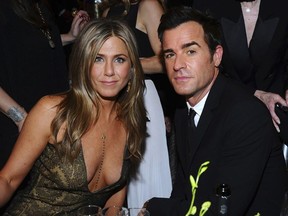 In this Jan. 25, 2015 file photo, Jennifer Aniston, left, and Justin Theroux pose in the audience at the 21st annual Screen Actors Guild Awards in Los Angeles.